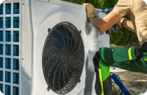 man fixing ac instrial